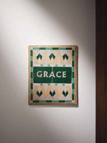 a sign that says garage on a wall at IZZA Marrakech in Marrakech