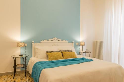 Voodi või voodid majutusasutuse Palazzo Spada - Appartamento Gabbiano toas