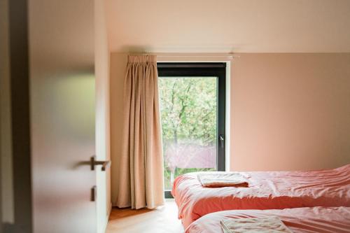 Postel nebo postele na pokoji v ubytování Living Lodges - Designer Lodge - Scandi Lodge