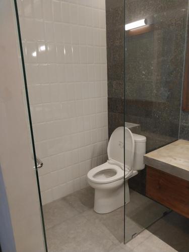 Salle de bains dans l'établissement Cuan House Ubud