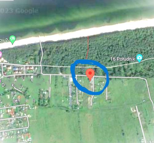 eine Karte mit rotem Herz im blauen Kreis in der Unterkunft KAPITAŃSKA 88 in Chłopy