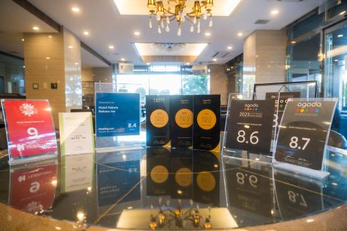 a display case in a store with a bunch of products at Hotel Hakata Nakasu Inn in Fukuoka
