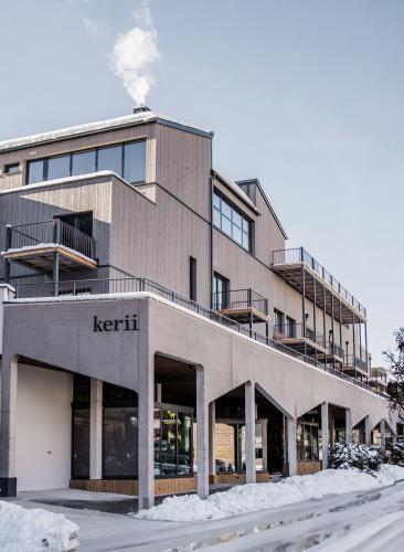 a kettachi building with snow in front of it at kerii - adults boutique hotel in Saalbach Hinterglemm
