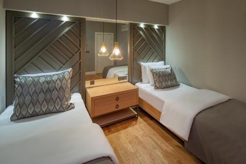 Postel nebo postele na pokoji v ubytování Barut Hemera - Ultra All Inclusive