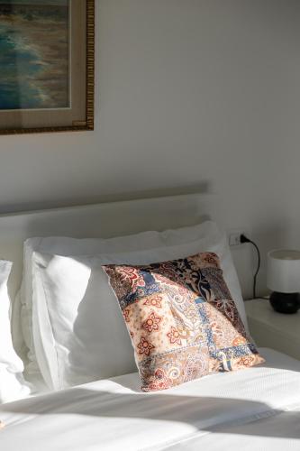Katil atau katil-katil dalam bilik di Villa Eugenia Suite - by MyHomeInComo