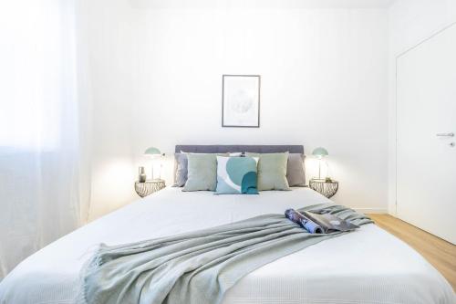 Кровать или кровати в номере CR-HOME - Suite di 55mq con arredi di design