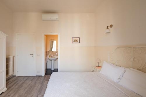 Ein Bett oder Betten in einem Zimmer der Unterkunft Dante's in Vaticano 2