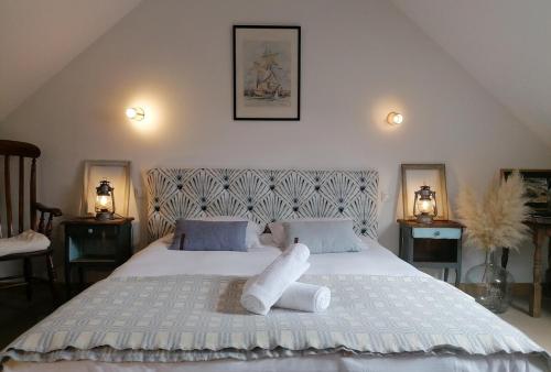 Postel nebo postele na pokoji v ubytování Maison de pêcheur Loguivy de la mer