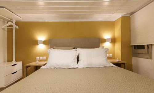 Ένα ή περισσότερα κρεβάτια σε δωμάτιο στο Olga Hotel Mouresi