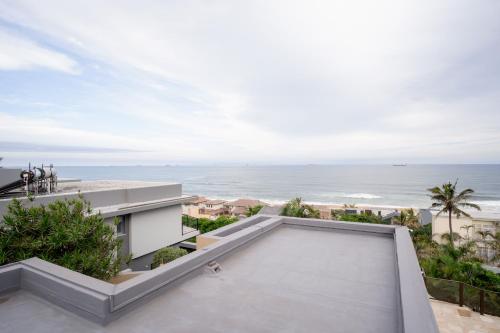 a view of the ocean from the balcony of a house at 145 Forest Drive - Umhlanga in Durban