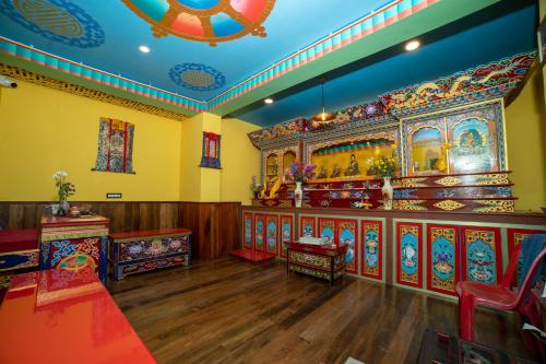 a large room with a large altar in a temple at Zip By Spree Hotels Gangtok in Gangtok