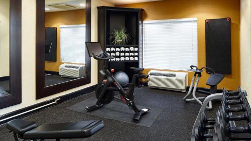 a fitness room with a gym with exercise equipment at Hilton Garden Inn Merrillville in Merrillville