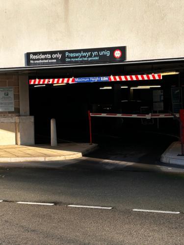 a subway entrance to a parking garage at City Centre apartment. in Wrexham