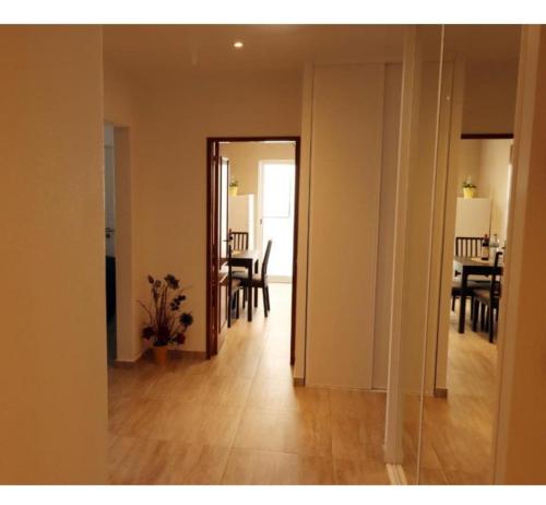 a view of a living room with a dining room at Apartamento Carmix in Portimão
