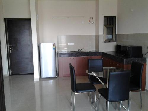Virtuvė arba virtuvėlė apgyvendinimo įstaigoje Vrindavan Guest House