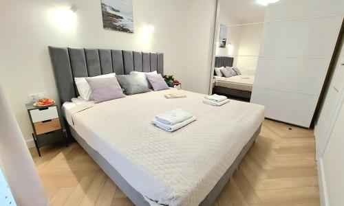 Posteľ alebo postele v izbe v ubytovaní Apartment Golden Beach by TriApart