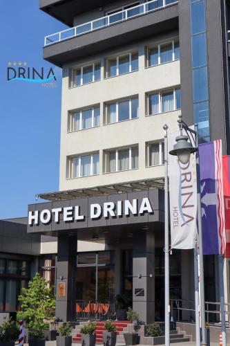 a hotel in front of a building at Drina Hotel in Bijeljina