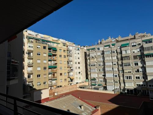 a view of some buildings from a window at Apartaments Marina - Abapart in Barcelona