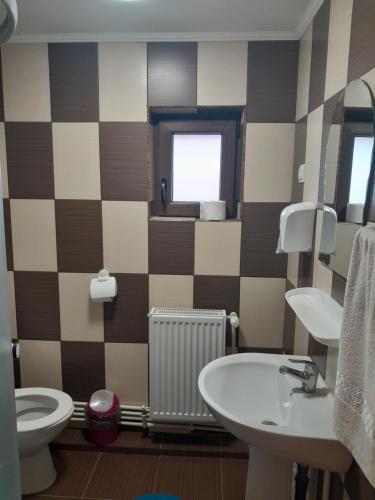 Koupelna v ubytování Apartamente Ambrus Praid