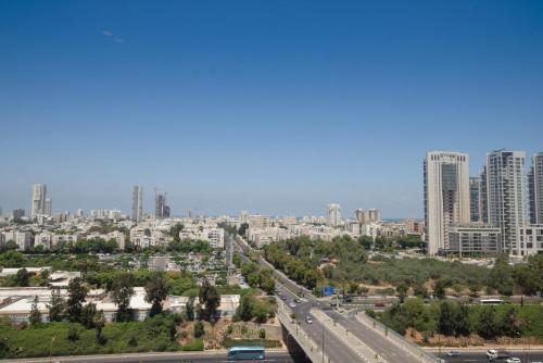 a view of a city with tall buildings at Leonardo City Tower Hotel Tel Aviv in Tel Aviv