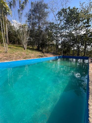 Kolam renang di atau di dekat Finca la Esperanza - Cabaña Villa Coqui
