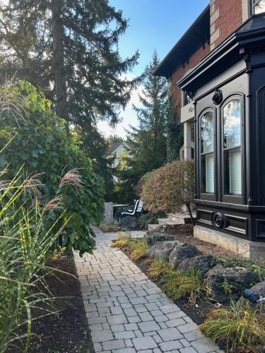 a walkway in front of a house at Norfolk Guest House Inn in Guelph