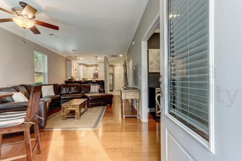 a living room with a couch and a table at 2142 Cape Sound condo in Fernandina Beach