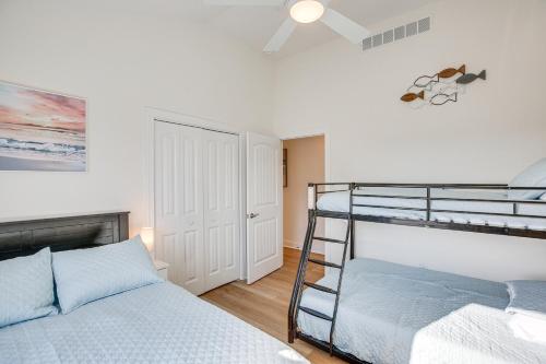 a bedroom with a bunk bed and a bunk bed at Spacious Wildwood Condo Walk to Beach! in Wildwood