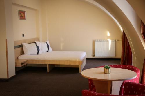 Postel nebo postele na pokoji v ubytování Hotel Clipa