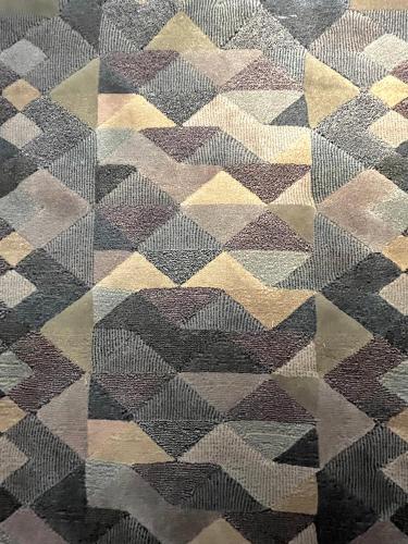 a close up of a floor with geometric patterns at The Iconic Lodge in Bellagio