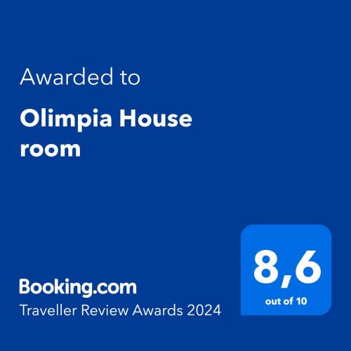 Certificado, premio, señal o documento que está expuesto en Olimpia House room