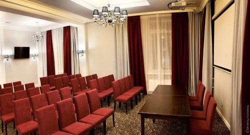 TV a/nebo společenská místnost v ubytování Vicomte Hotel