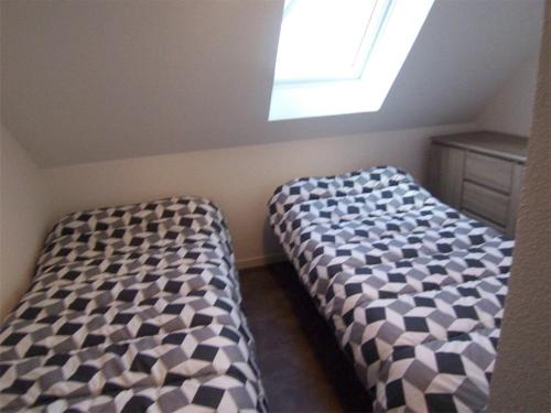 En eller flere senge i et værelse på Maison Carnac, 3 pièces, 4 personnes - FR-1-377-46