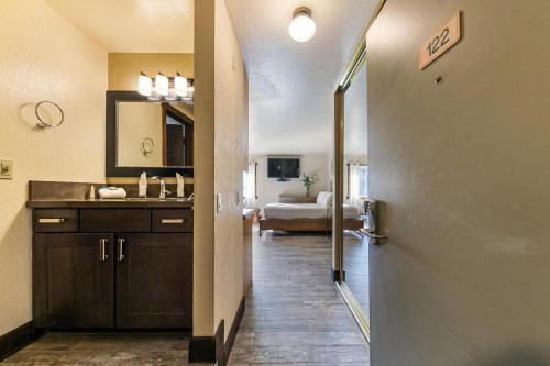 a bathroom with a sink and a mirror at Lovely Studio w/Kitchen and Partial Lake View #122 at Donner Lake Village in Truckee