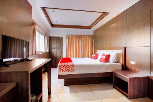 Cama o camas de una habitación en OYO 629 Chaytalay Palace Hotel