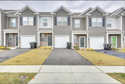 a house with a driveway in front of it at Air Home , New Jersey, year 2023 in Sicklerville