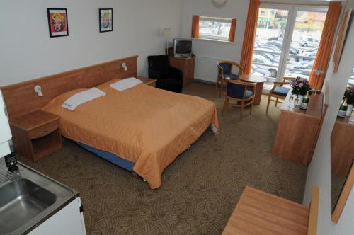 Postel nebo postele na pokoji v ubytování Hotel Hirtshals