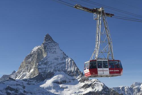 a ski lift in front of a mountain at Haus Alpenschloss in Zermatt