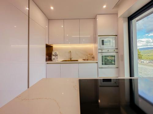 Dapur atau dapur kecil di Flora Guest House
