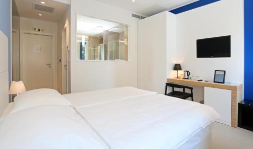 Ένα ή περισσότερα κρεβάτια σε δωμάτιο στο Guesthouse Villa Scalaria