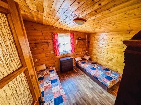 an overhead view of a room in a log cabin at Ranč Skalka in Rousínov
