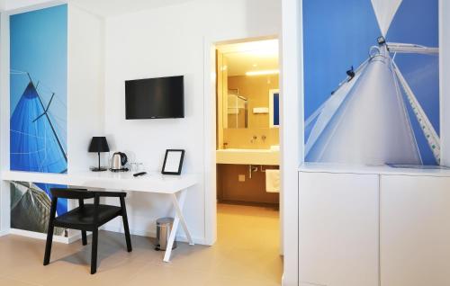 Μια τηλεόραση ή/και κέντρο ψυχαγωγίας στο Guesthouse Villa Scalaria