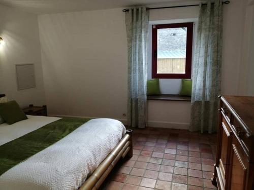 Cama o camas de una habitación en gite de la Marzelle