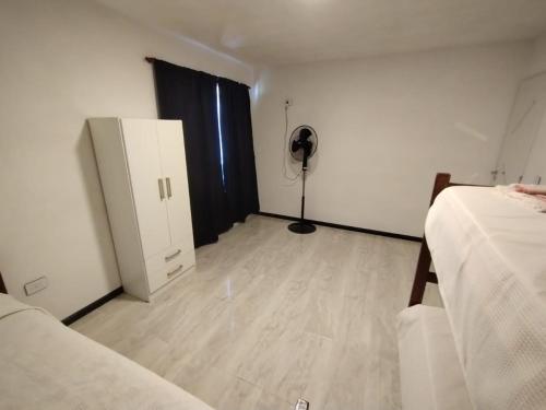 Ένα ή περισσότερα κρεβάτια σε δωμάτιο στο La Mora