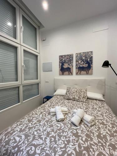 Alfonso XIII Aparments 1 tesisinde bir odada yatak veya yataklar