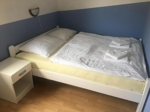 Ένα ή περισσότερα κρεβάτια σε δωμάτιο στο Apartment Hribar
