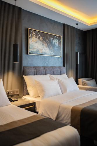 Кровать или кровати в номере Trendlife Hotels Uludağ ALL INCLUSIVE