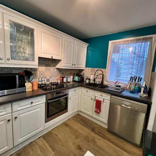 Photo de la galerie de l'établissement 3 pieces - 6 couchages a Rosny sous Bois - Prés du Métro - Rer - Bus, à Rosny-sous-Bois