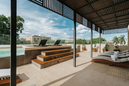 Bazén v ubytování Kahal Hotel - Paseo Montejo nebo v jeho okolí