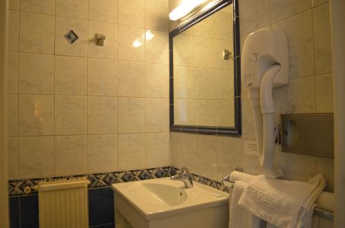 Koupelna v ubytování Hotel Le Beau Site